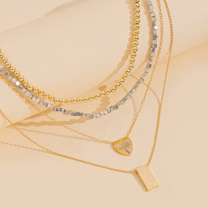 Wholesale Artistic retro layered necklace with gold and silver color blocking design, layered and heart-shaped square pendant