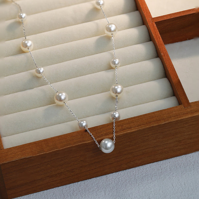 Wholesale Titanium steel pearl necklace sweater chain long bead light luxury niche tassel collarbone chain neck chain