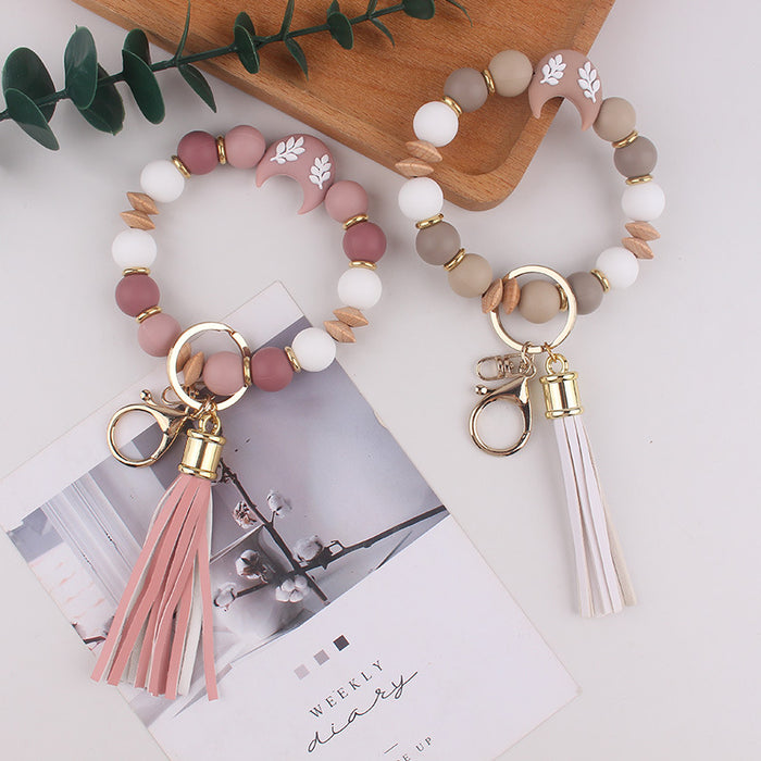 Wholesale Silicone moon beads bag key bracelet bracelet silicone beads beech wood beads tassel keychain