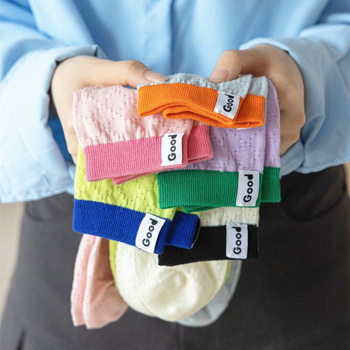 Wholesale Color blocked socks with hollowed out mesh and breathable lettering fabric label, colored midsole socks