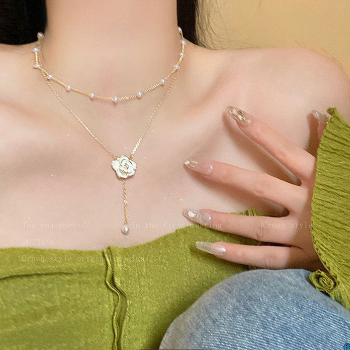 Wholesale Double layered tassel pearl necklace, niche design pendant, collarbone chain, high-end temperament, neck chain