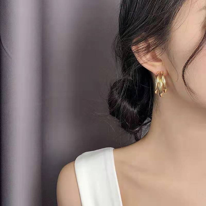 Wholesale C-shaped multi-layer fashionable and compact design earrings and earrings with geometric temperament and metallic texture