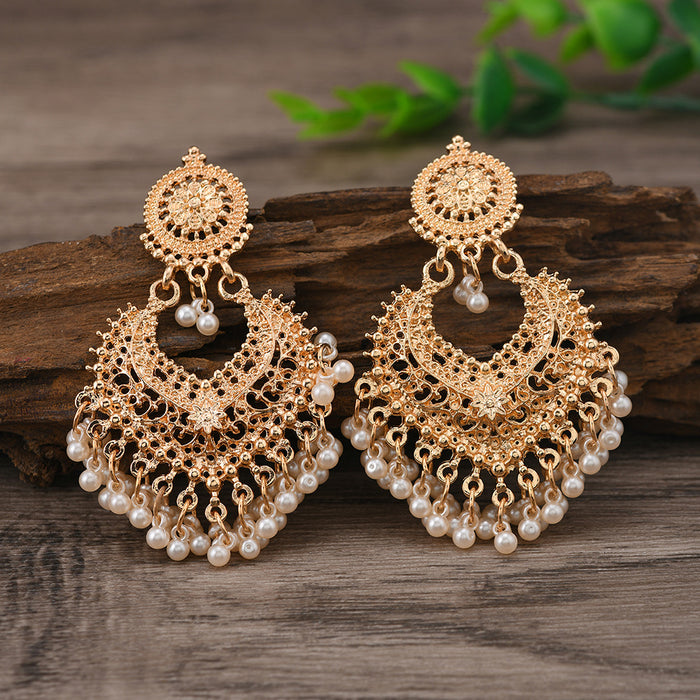 Wholesale Retro Bohemian ethnic style earrings for women exaggerated temperament hollow heart earrings long bell India