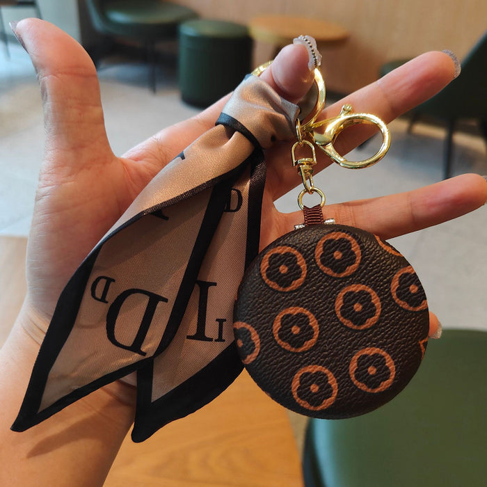 Wholesale light luxury and exquisite presbyopic leather cosmetic mirror key chain pendant double-sided mirror bag pendant JDC-KC-JiYou007