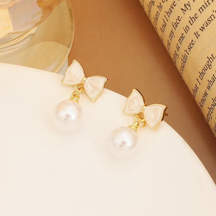 Wholesale Pearl earrings, light luxury earrings, high-end temperament, butterfly bow, niche design, earrings