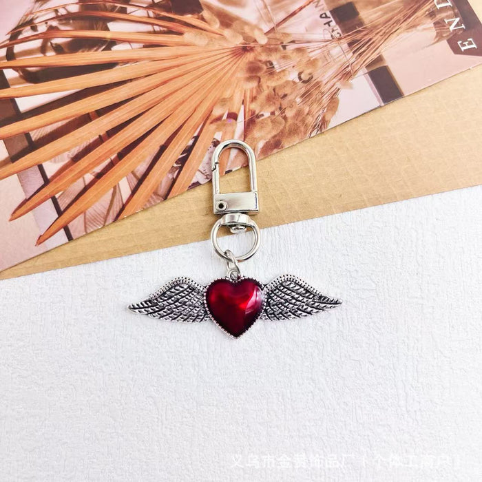 Wholesale Gothic style dark keychain pendant metal heart hot girl style palm bag cross pendant