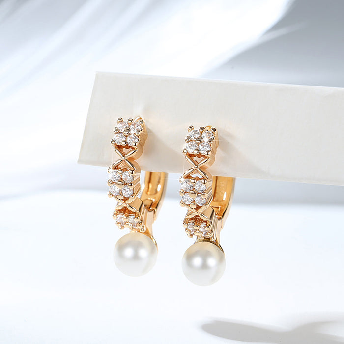 Wholesale Copper gold-plated retro light luxury simple pearl earrings, small and fashionable design, inlaid with zircon ear buckles, wholesale of ear accessories