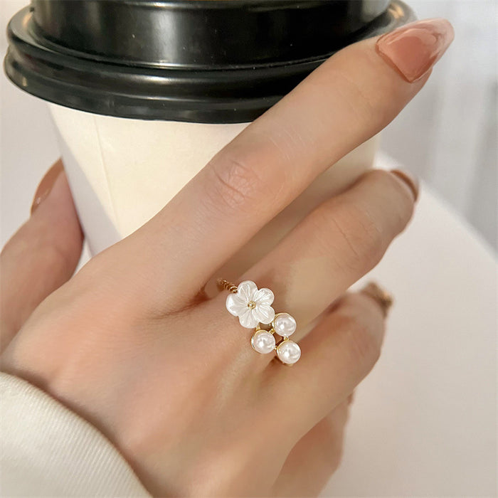 Wholesale Flower ring, female niche design, high-end temperament, pearl index finger ring, fashionable and personalized ring