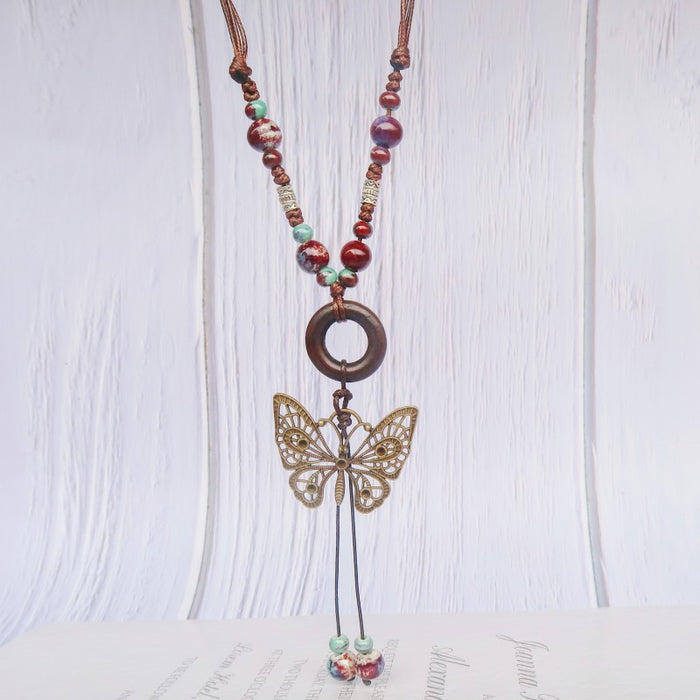 Wholesale Long sweater chain women's pendant retro butterfly necklace