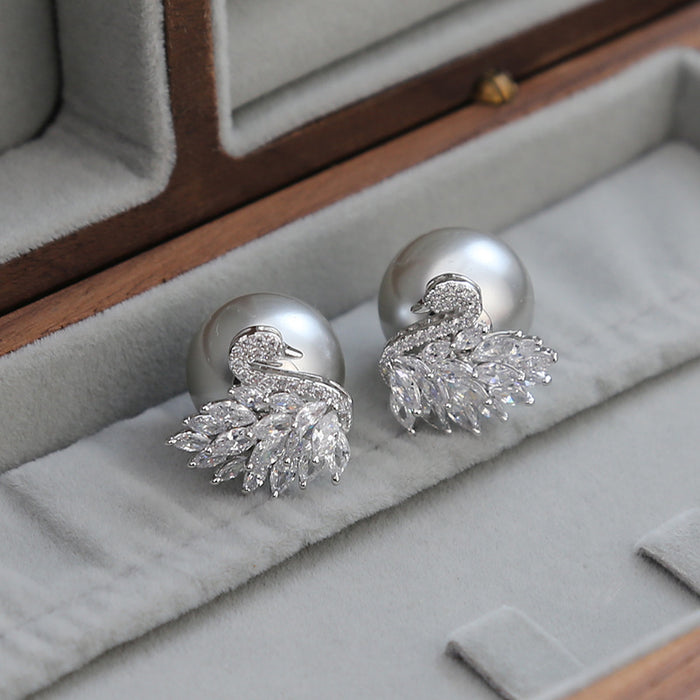 Wholesale Swan full diamond zircon pearl earrings, light luxury and high-end earrings, new silver needle fashionable and personalized earrings for women