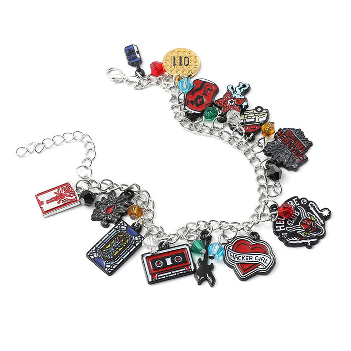 Wholesale cartoon cute strange story bracelet zinc alloy drop oil pendant jewelry