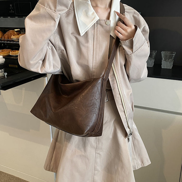 Wholesale Retro commuting single shoulder large capacity crossbody bag, fashionable and versatile tote bag