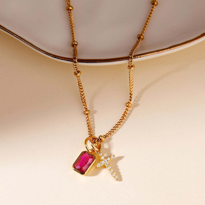 Wholesale Fully encrusted cubic zirconia cross birthstone necklace