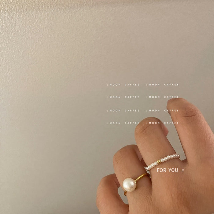 Wholesale Light luxury mini pearl bead elastic rope ring with a retro temperament that does not touch the wrist circumference, freshwater pearl ring