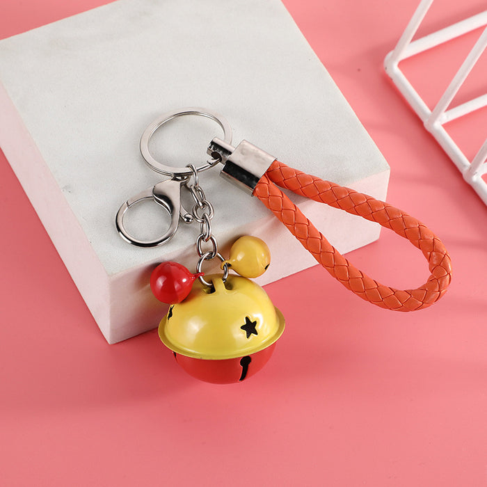 Wholesale Bag hanging decoration small gift creative woven leather rope bell keychain fashionable multi-color bell