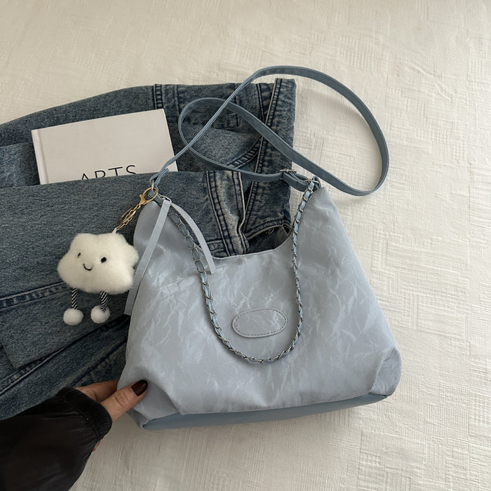 Wholesale Personalized commuting shoulder bag, fashionable large capacity tote bag, casual