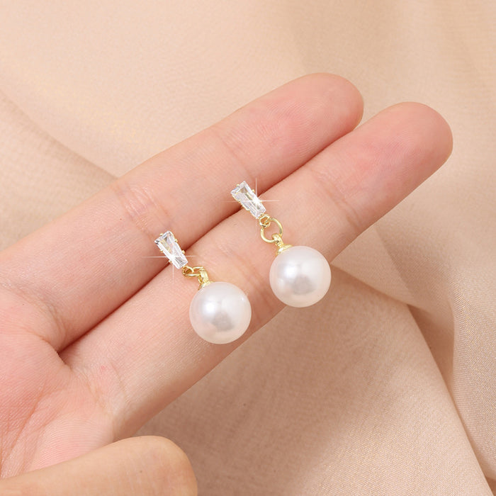 Wholesale Retro pearl earrings with simple and fashionable temperament, personalized and high-end feeling, diamond studded earrings