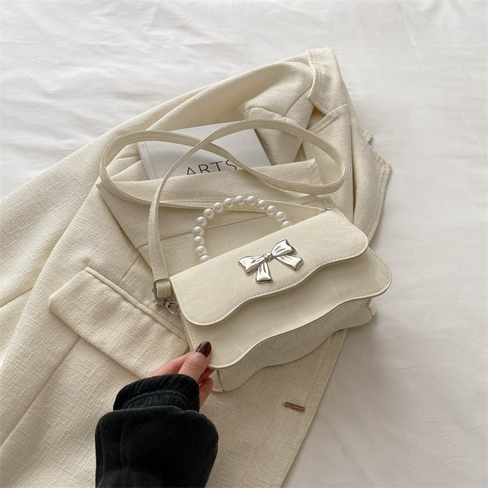 Wholesale Fashionable pearl handbag, crossbody, stylish design, butterfly texture small square bag