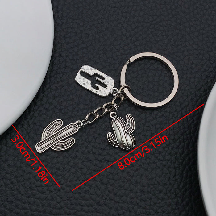 Wholesale Oil-dripping hat pistol metal keychain