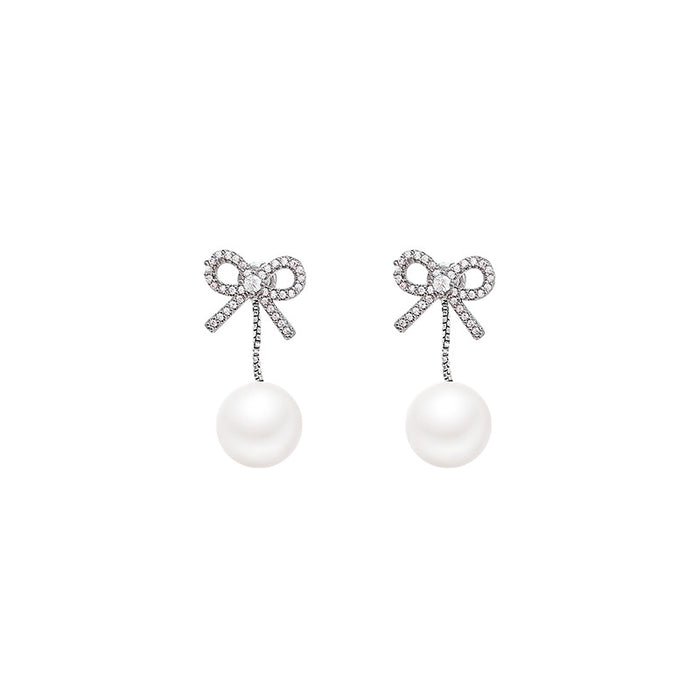 Wholesale Butterfly knot imitation pearl tassel earrings, light luxury temperament, earrings, earrings, studs, earrings