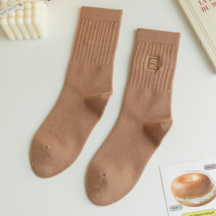 Wholesale Woolen socks in autumn and winter, solid color, vertical stripes, woolen midsole socks, thick and warm, stacked long socks