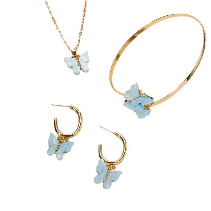 Wholesale Versatile alloy butterfly earrings, bracelets, necklaces, four piece jewelry pendant set