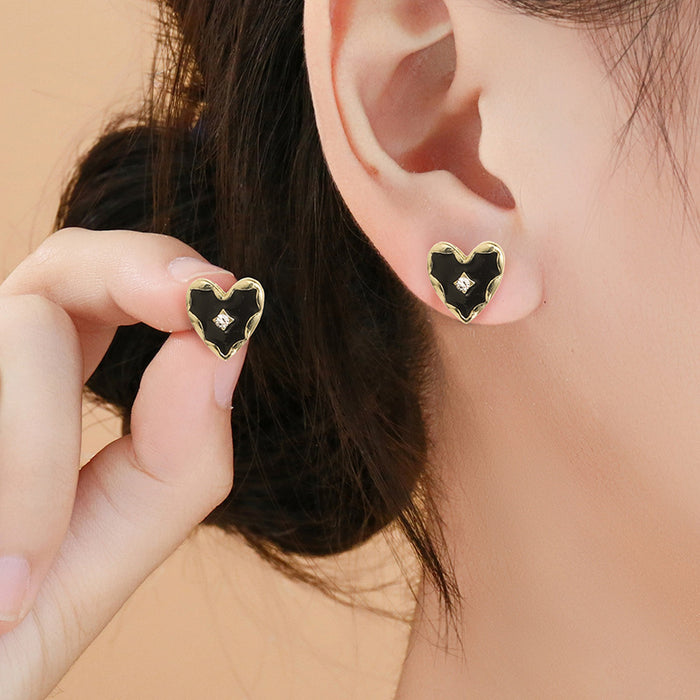 Wholesale Black and gold color heart butterfly earrings niche round earrings for women