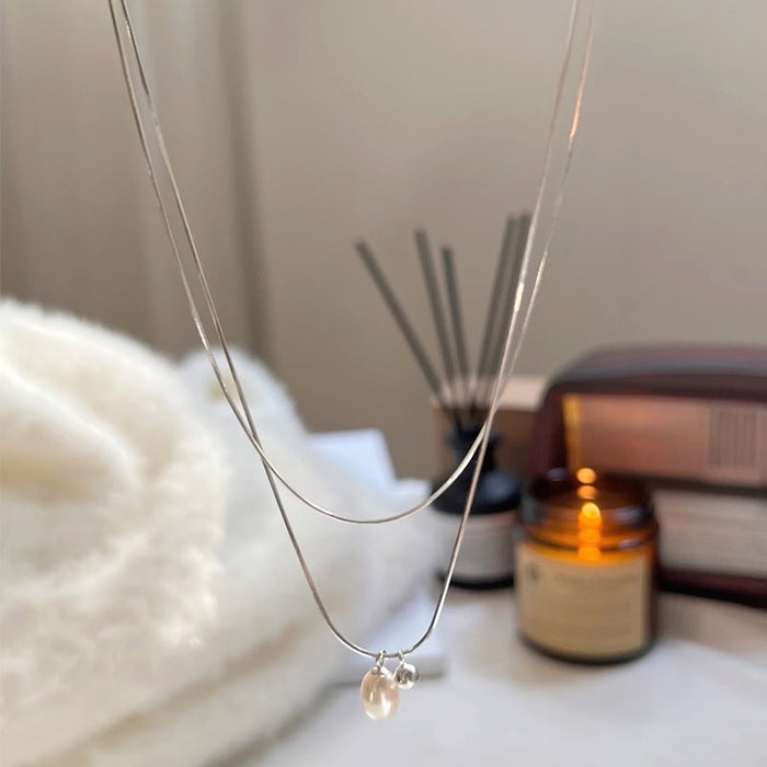 Wholesale Simple double-layer stacked natural pearl necklace, fashionable and personalized collarbone chain, versatile and high-end