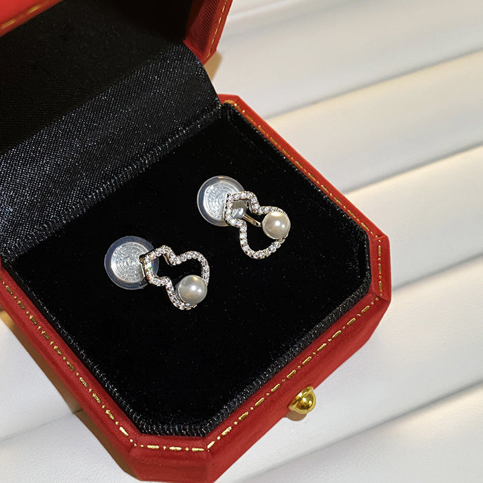 Wholesale Hollow out earrings with pearls, niche micro inlaid zircon earrings, high-end ear clips without ear holes, and a sense of luxury