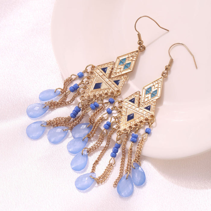 Wholesale Long tassel chain earrings, fashionable and personalized feather earrings, niche ethnic style ear hooks and earrings