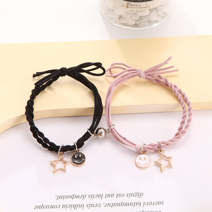 Wholesale Cartoon couple bracelets a pair of small rubber band magnets attract bell bracelet gift