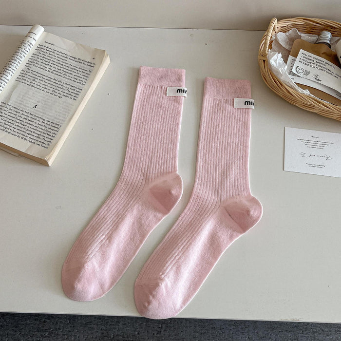 Wholesale Medium length socks with solid color letters, fabric labels, stacked socks, thin cotton socks, sweat absorbing and breathable