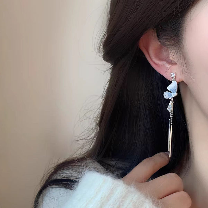 Wholesale Crystal tassel earrings, butterfly disc, pearl temperament earrings, personalized, fashionable, high-end earrings