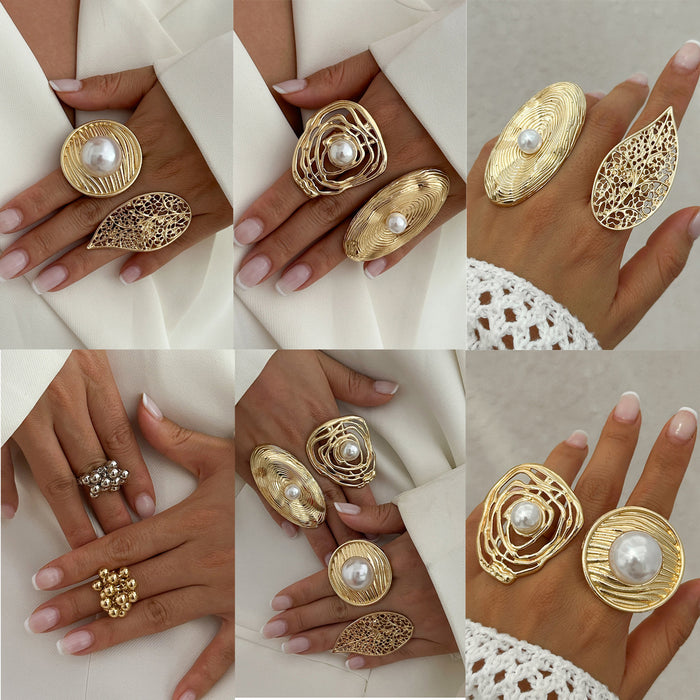 Wholesale Regular hollow winding imitation pearl ring niche alloy open ring