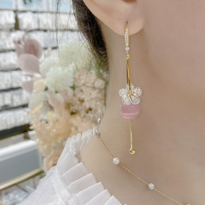 Wholesale Light luxury zircon five petal flower earrings, exquisite earrings, fashionable temperament, long style