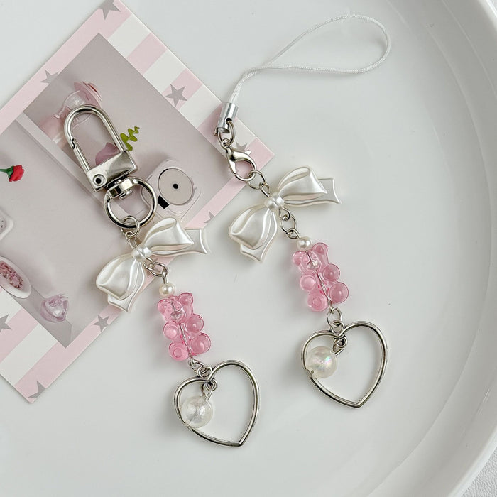 Wholesale Small niche design pendant with sweet bow, phone chain, pink teddy bear, car keychain, pendant