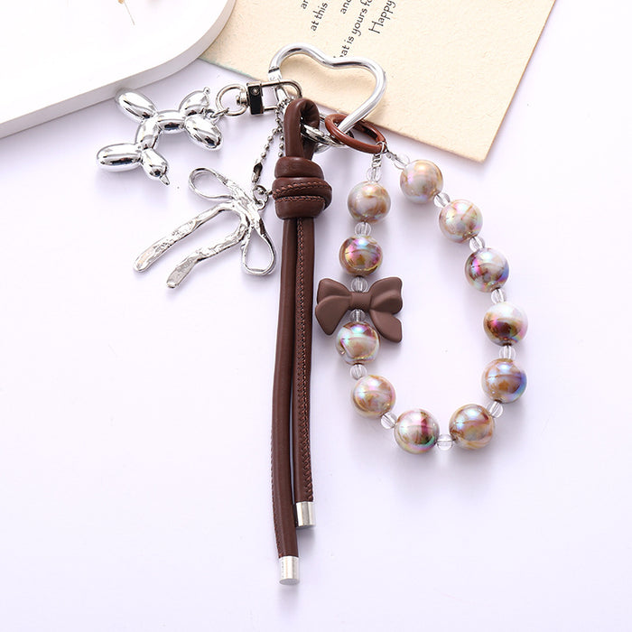 Wholesale Leather bow heart pendant luggage keychain lanyard accessories single buckle tassel pendant accessories