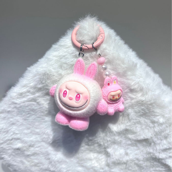 Wholesale Flocked egg boy pull cloth high value cute mini doll ornaments pendant three-dimensional resin accessories