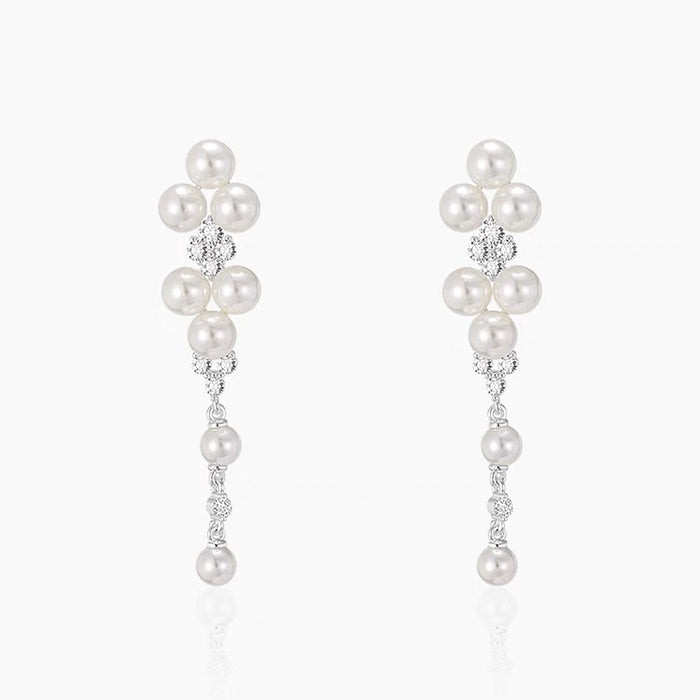 Wholesale Elegant long pearl ear clip without ear hole tassel earrings, fashionable and light luxury
