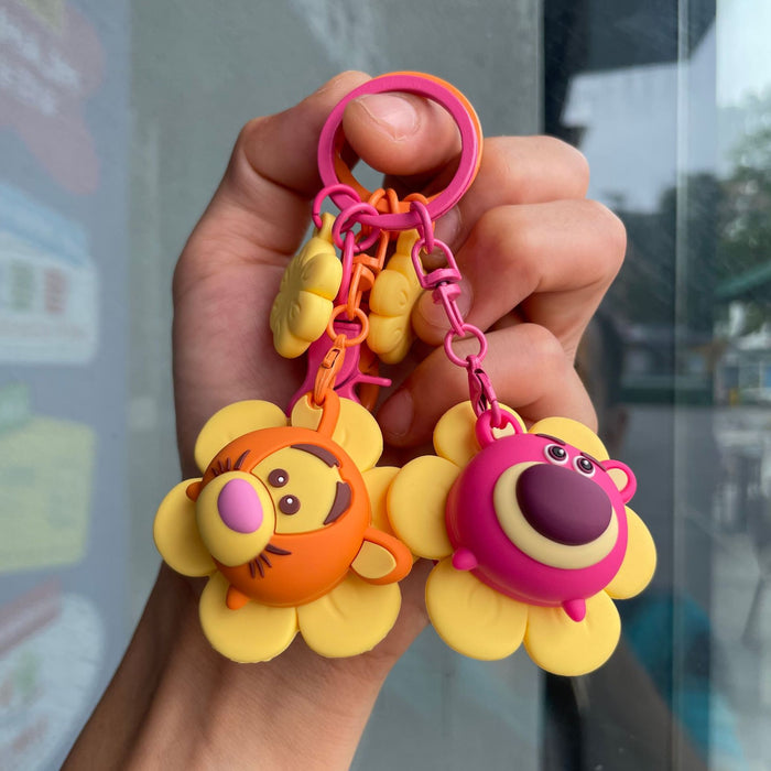Wholesale Rotating keychain, cute doll bag pendant, hanging decoration, car keychain, smiling face style