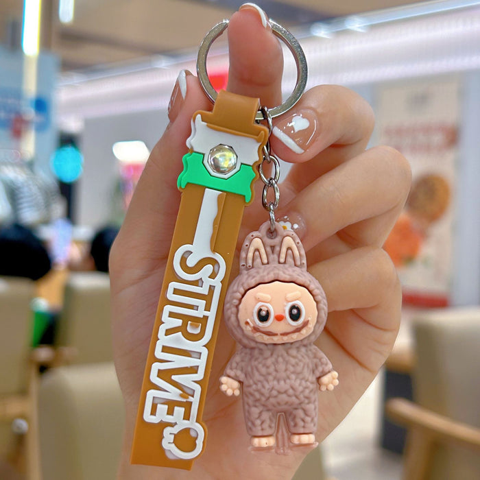 Wholesale Cute cartoon silicone keychain with cute little monster keychain for sweatshirt