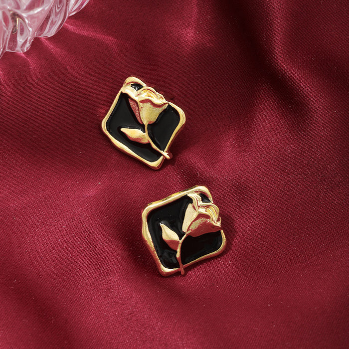 Wholesale Vintage rose silver needle earrings autumn and winter new item niche painting oil rose flower wholesale