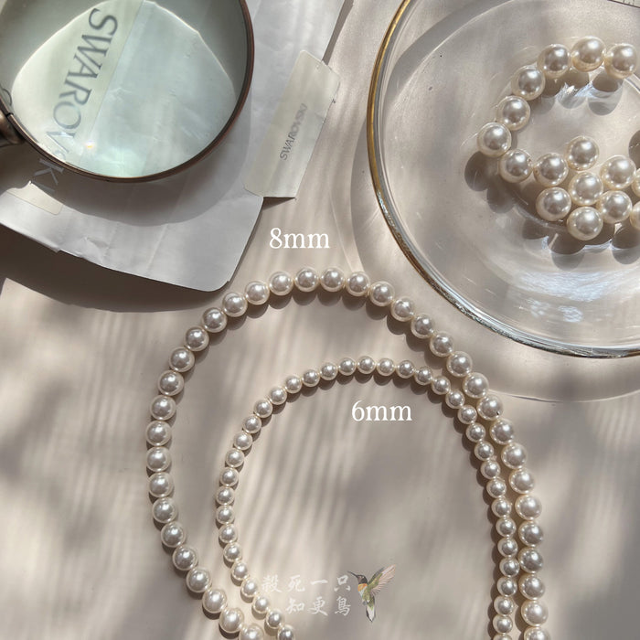 Wholesale Pearl necklace, women's light luxury, autumn and winter high-end feeling, collarbone chain, sweater accessories, necklace