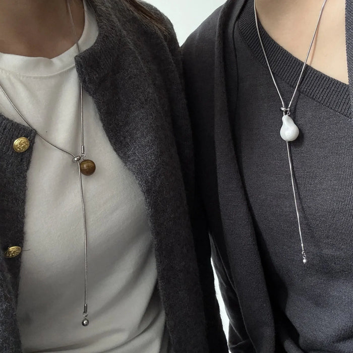 Wholesale Titanium steel design necklace, pearl niche personalized necklace, sweater chain