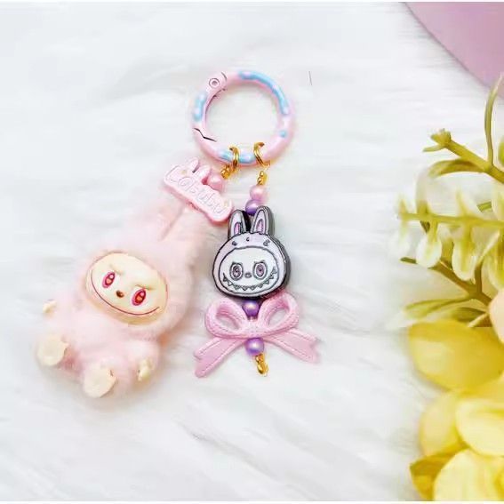 Wholesale Flocking mini keychain baby-free vinyl cute grain mobile phone pendant trendy accessories