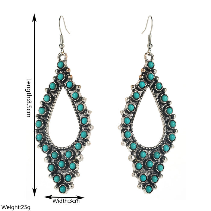Wholesale Vintage cross-shaped openwork oval turquoise earrings