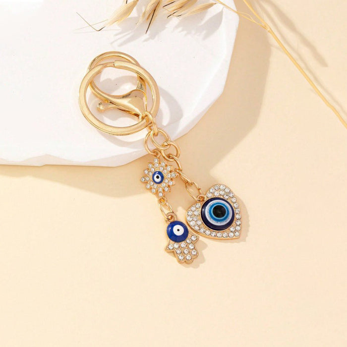 Wholesale Heart-Shaped Palm Water Drop Devil's Eye Pendant Keychain