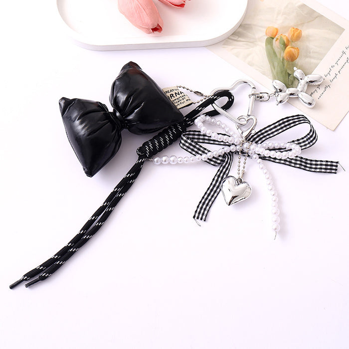 Wholesale Leather bow heart pendant luggage keychain lanyard accessories single buckle tassel pendant accessories