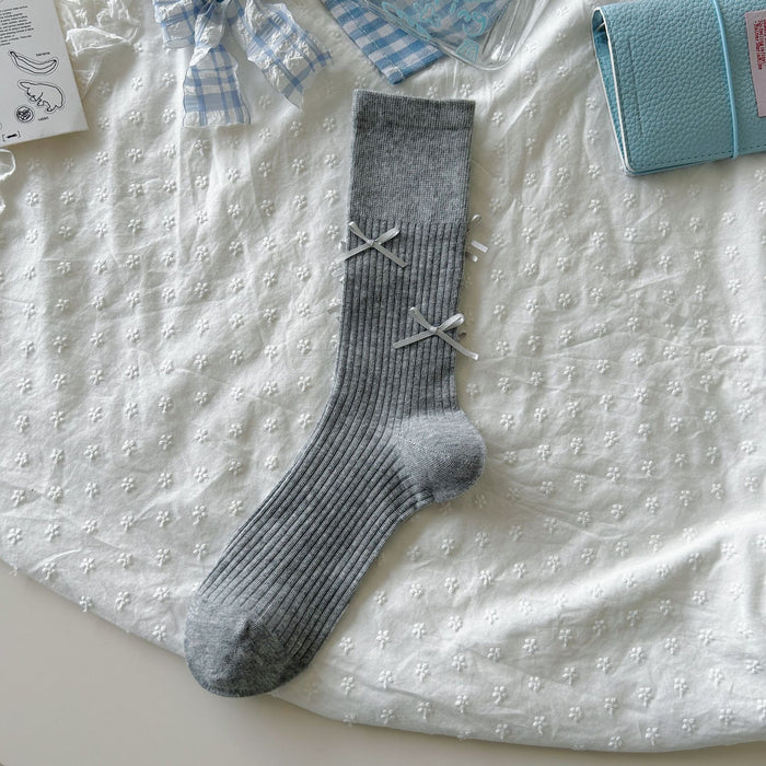 Wholesale Bow tie socks, long tube pile socks