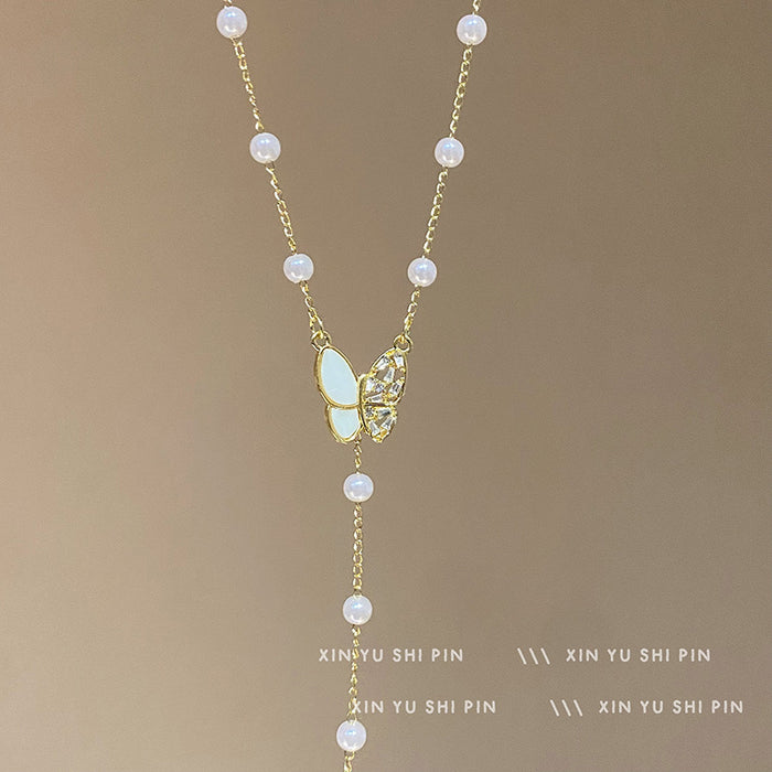 Wholesale Butterfly tassel pearl necklace, light luxury, high-end feeling, collarbone chain, new necklace